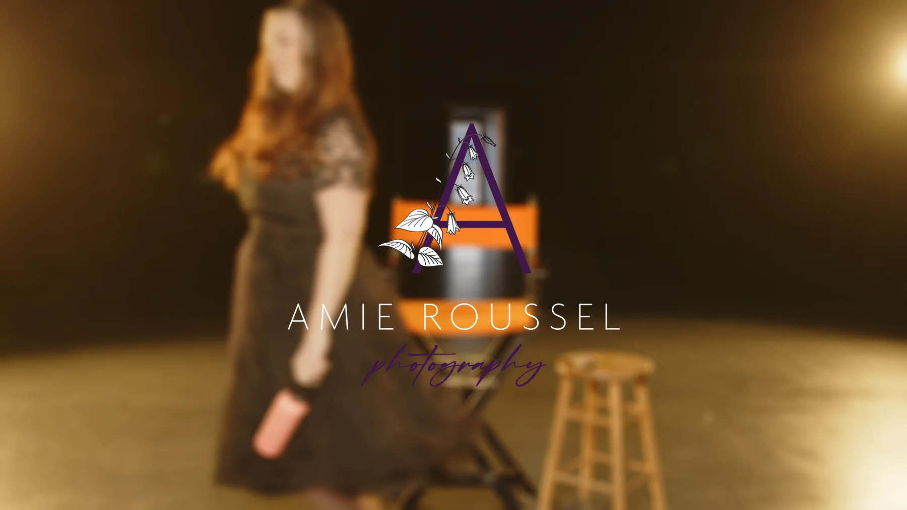 Family with a newborn during Amie Roussel Photography video coverage.