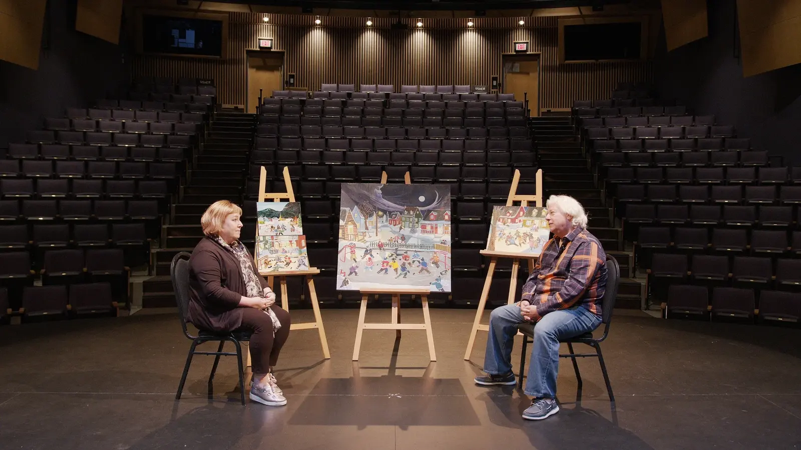 ArtsCO interview frame with an artist and paintings on easels.