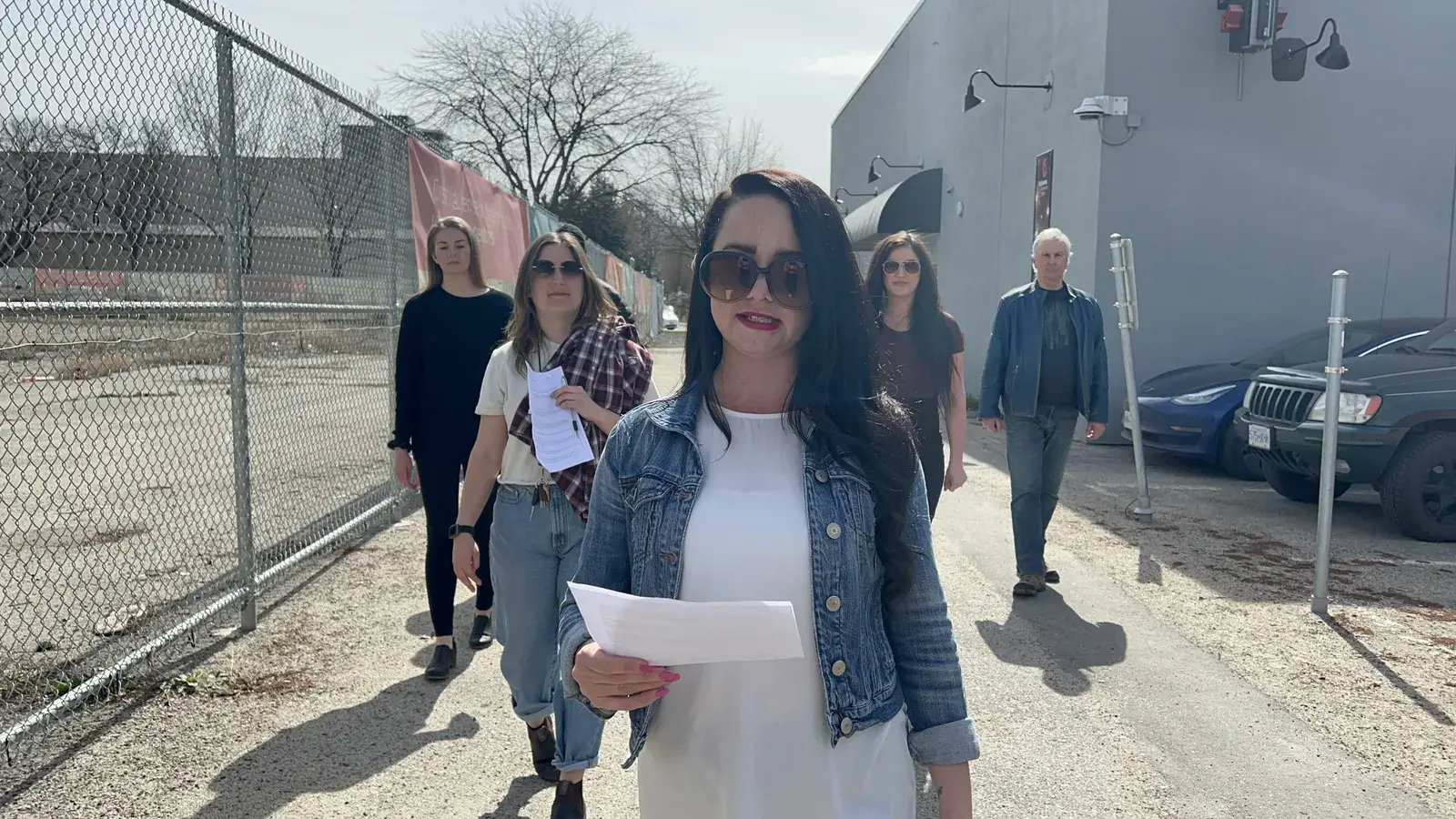 BrainTrust Canada cast rehearses walking-blocking outside in Kelowna.
