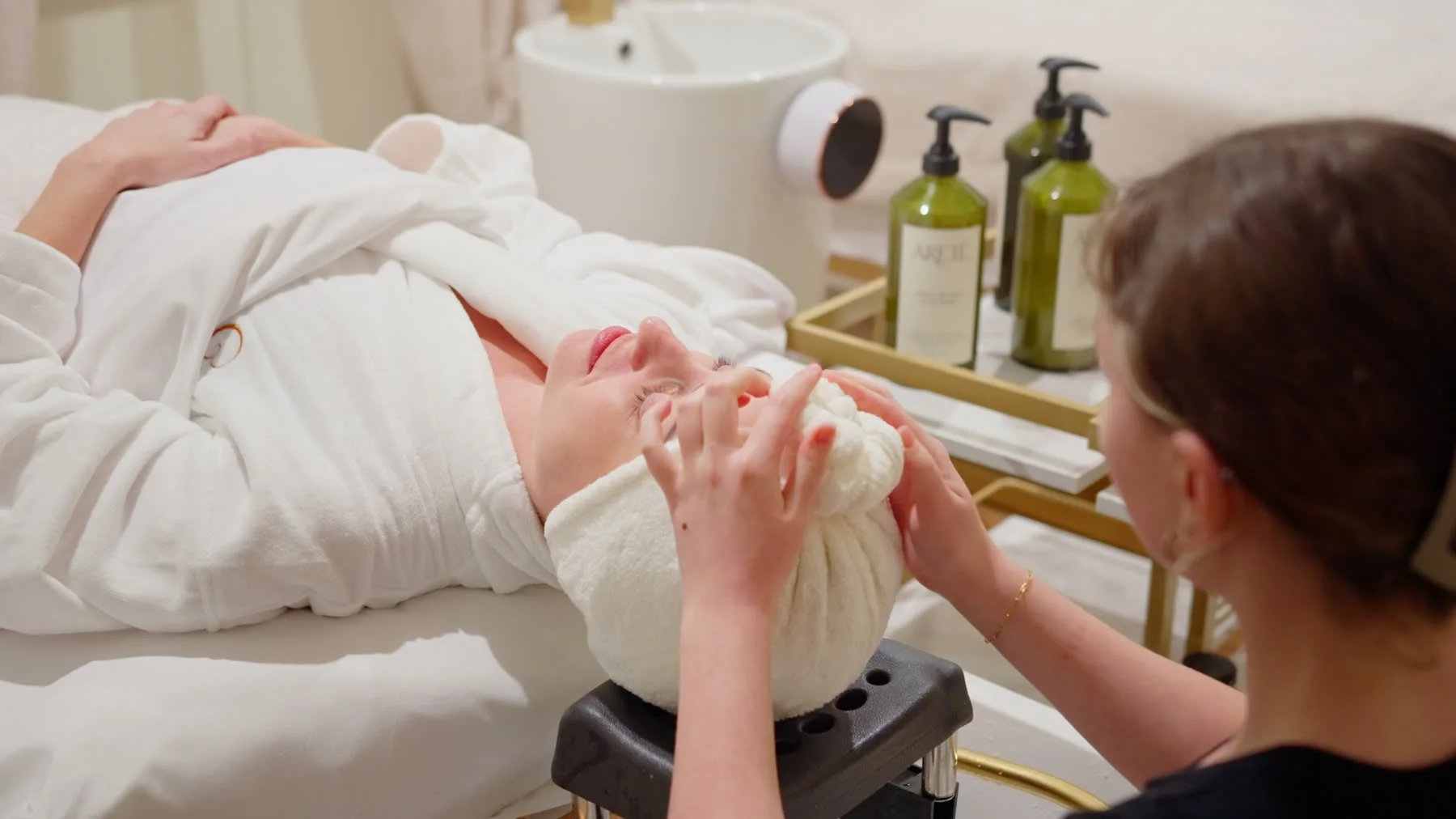 Scalp spa treatment from the finished Cleopatra's Rituals launch video.