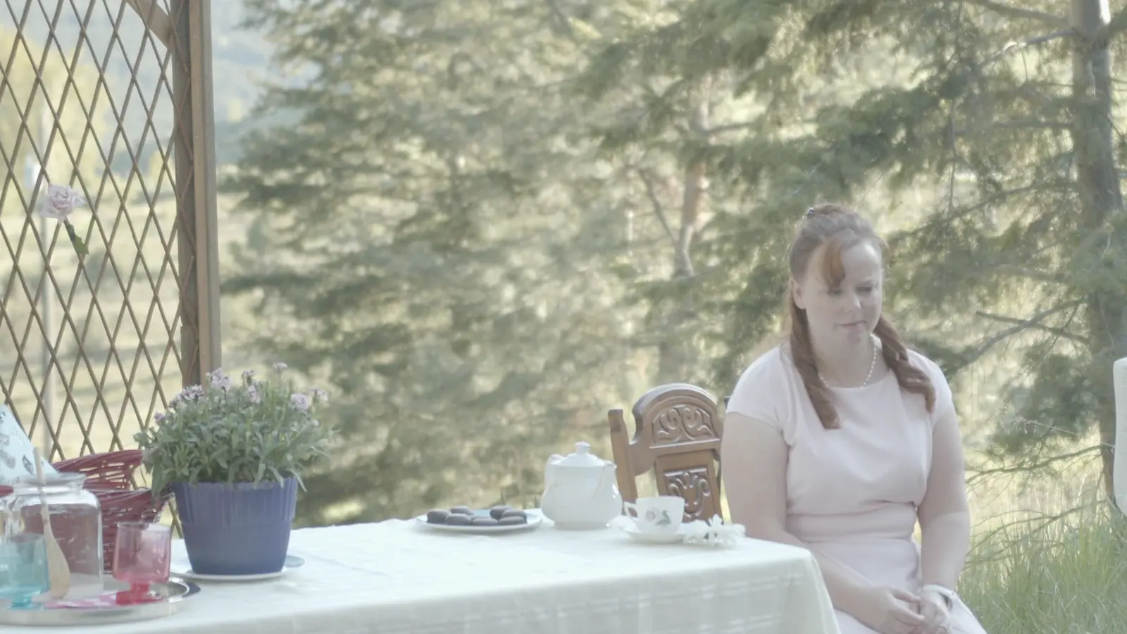 Outdoor performance frame from The Pink Unicorn with Kendra Hesketh on a small staged set.