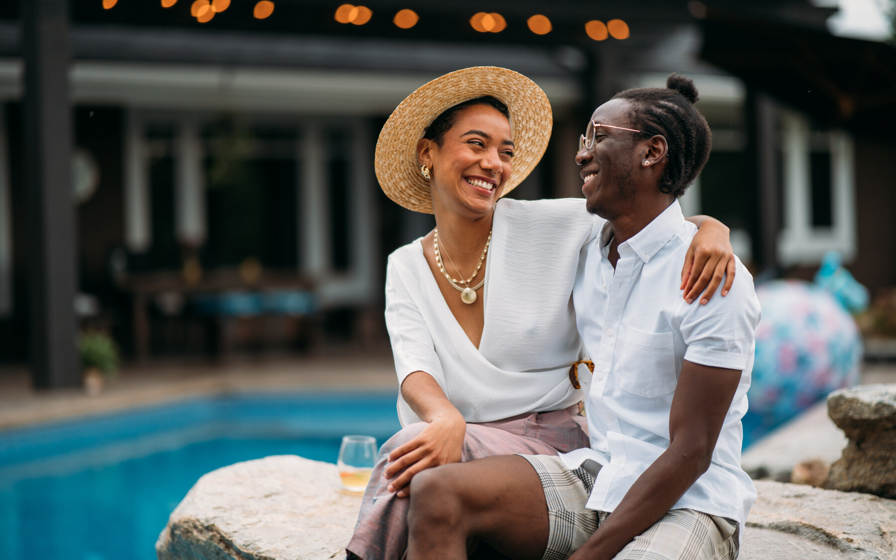 Two models toast outdoors in lifestyle imagery created for Zeff.